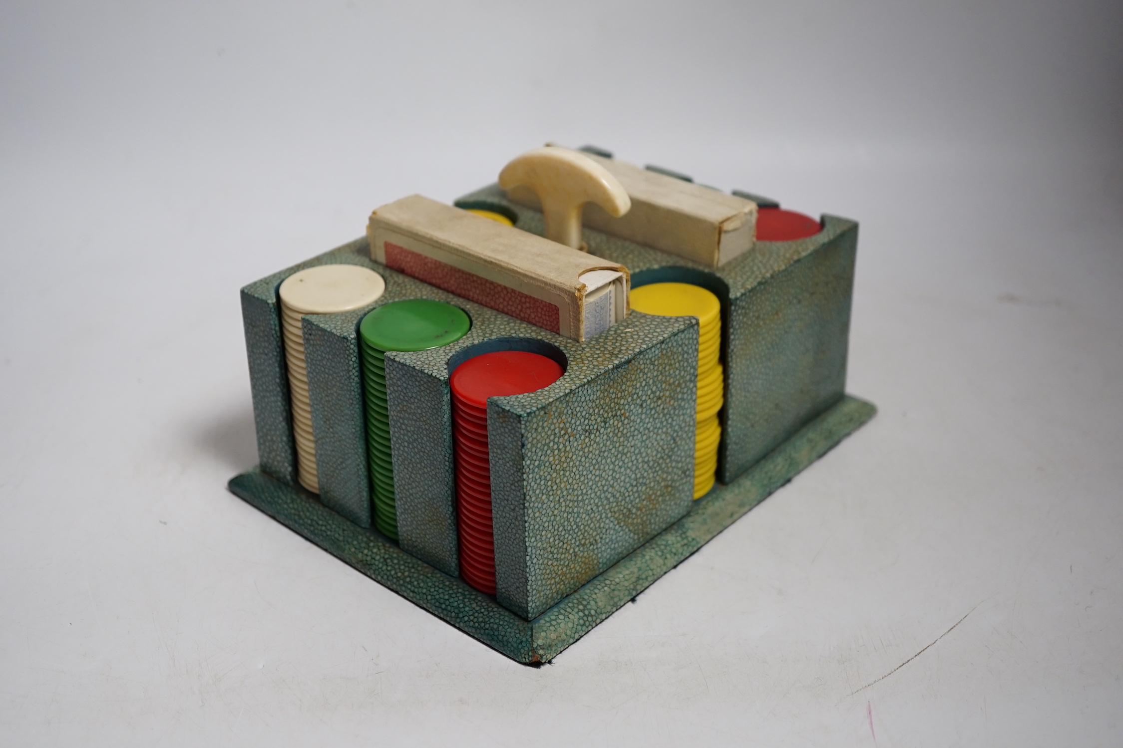 An Art Deco shagreen poker gaming set, ivory mounted with bakelite counters and two card packs by Goodall, London., CITES Submission reference 5SWXP1K4